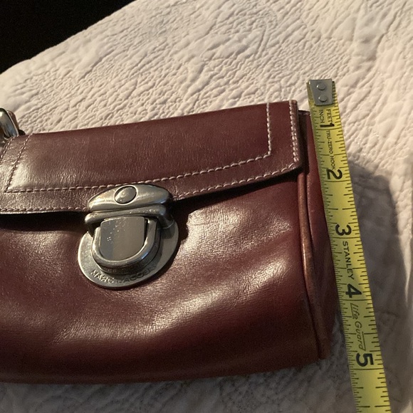 Marc Jacobs wrist bag with bold hardware